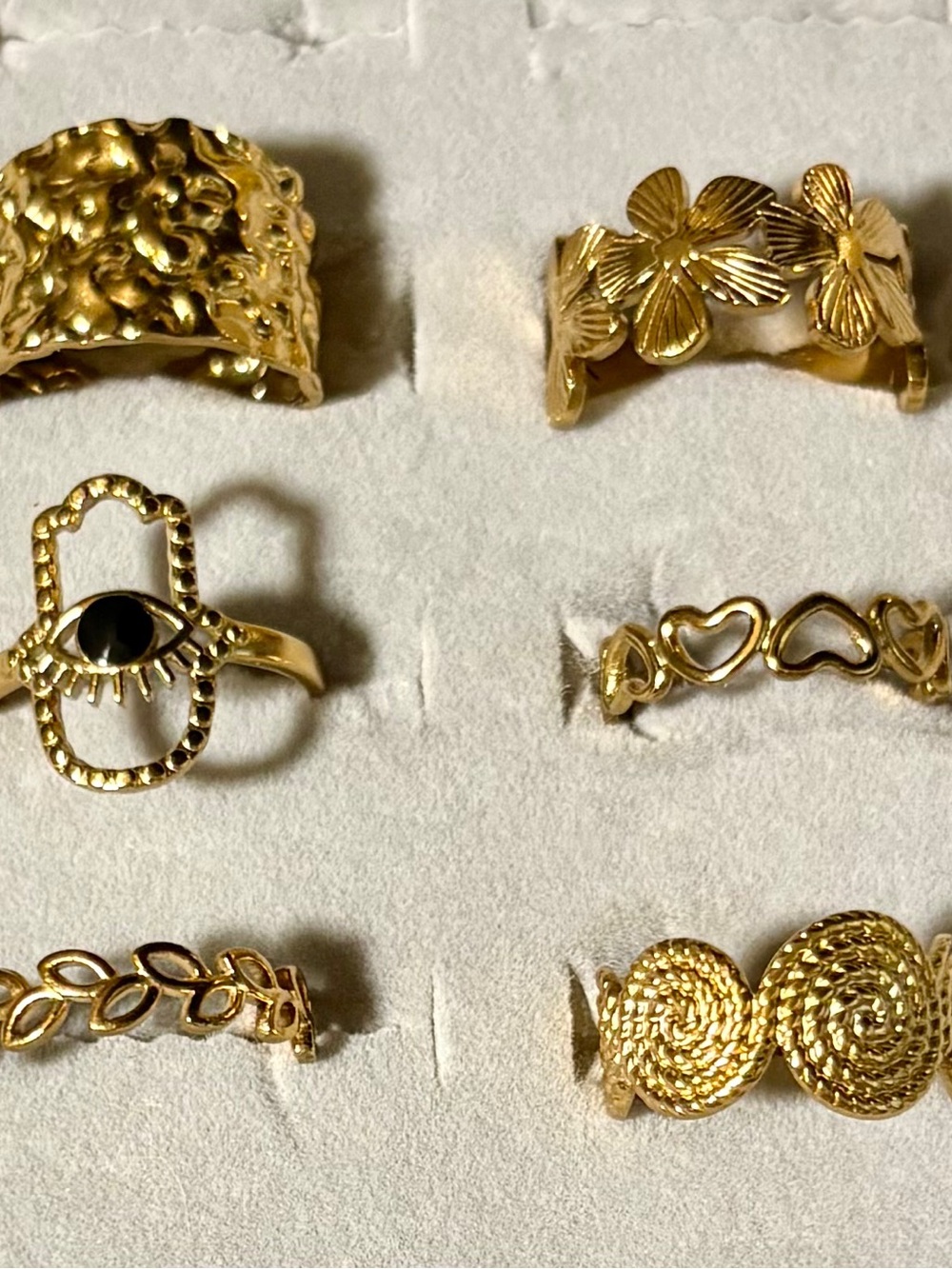 18k gold plated, hypoallergenic, brand new pack of 6 adjustable rings.